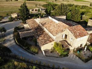 an aerial view of an old house with rusty roofs at Lou mas li Pitchoun "Le Luberon " in Gordes