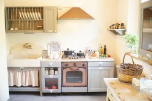 Kuchyň nebo kuchyňský kout v ubytování Agriturismo Fattoria Togonegro