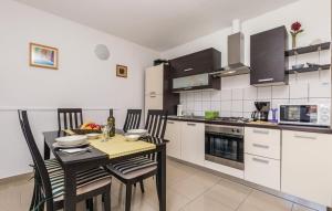 Kuchyň nebo kuchyňský kout v ubytování Apartments Duplic + 19 fotografií