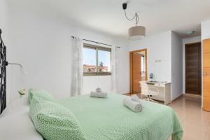 Posteľ alebo postele v izbe v ubytovaní Villa Perez + 16 fotografií