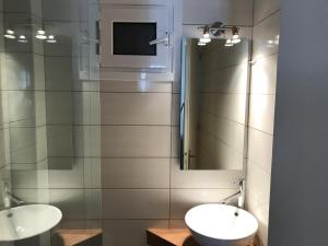 A bathroom at Marisia Apartment II