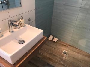 A bathroom at Marisia Apartment II