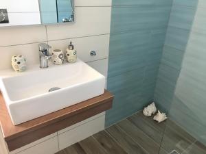 A bathroom at Marisia Apartment II