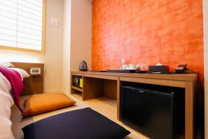 Kuchyň nebo kuchyňský kout v ubytování KIN HOTEL
