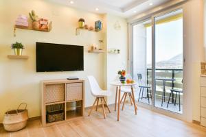 TV a/nebo společenská místnost v ubytování Benalmadena Top Floor Studio