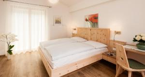 Postel nebo postele na pokoji v ubytování Garni Appartment Wagnerhof + 32 fotografií