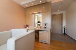 a kitchen with a counter and a sink in a room at Villa Natalia in Neum