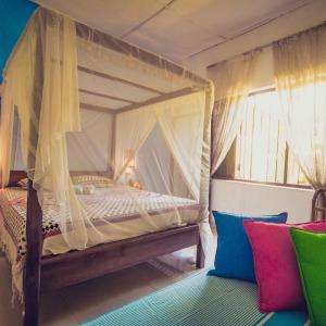 Postel nebo postele na pokoji v ubytování Golden Lodge Tangalle