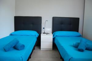 Posteľ alebo postele v izbe v ubytovaní Paradise Court Las Americas WiFi Pool 57