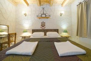Postel nebo postele na pokoji v ubytování Days inn Cappadocia