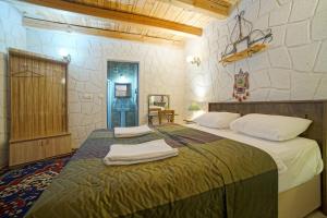 Postel nebo postele na pokoji v ubytování Days inn Cappadocia