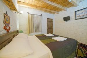 Postel nebo postele na pokoji v ubytování Days inn Cappadocia