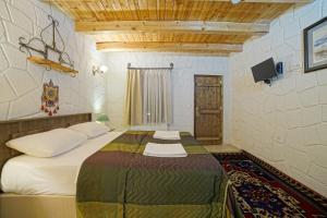 Postel nebo postele na pokoji v ubytování Days inn Cappadocia