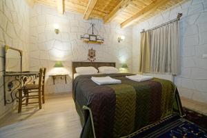 Postel nebo postele na pokoji v ubytování Days inn Cappadocia