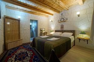 Postel nebo postele na pokoji v ubytování Days inn Cappadocia