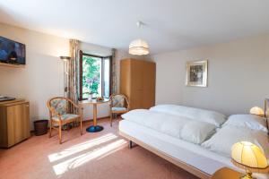 TV a/nebo společenská místnost v ubytování Hotel & Spa Cacciatori