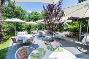 O grădină în afara Hotel & Spa Cacciatori