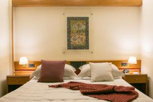 Postel nebo postele na pokoji v ubytování Best Western Hotel Dei Cavalieri