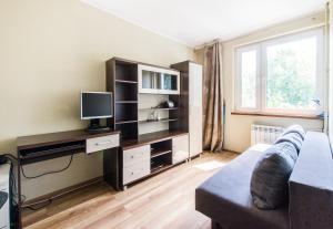 Μια τηλεόραση ή/και κέντρο ψυχαγωγίας στο Smart Rental Management Kotlarska Apartment