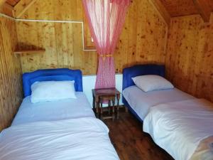 Ένα ή περισσότερα κρεβάτια σε δωμάτιο στο Bungalovi Vukovic