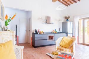 A kitchen or kitchenette at Tenuta La Santissima