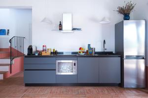 A kitchen or kitchenette at Tenuta La Santissima