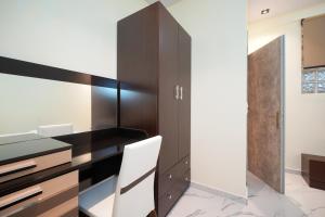 Kuchyň nebo kuchyňský kout v ubytování Eridon Suites