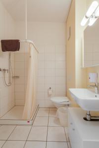 
Ein Badezimmer in der Unterkunft Anstatthotel.ch Hochdorf
