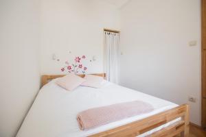 Postel nebo postele na pokoji v ubytování Apartment Atlas