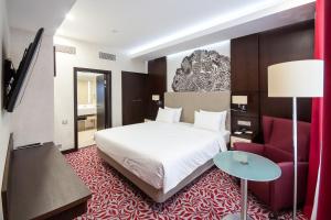 Postel nebo postele na pokoji v ubytování Bashkiria Hotel