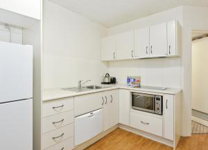 Dapur atau dapur kecil di Summit Apartments +18 gambar
