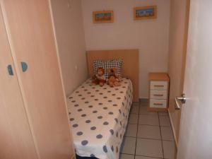 Llit o llits en una habitació de Primera Linea de Mar Portaventura