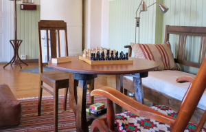 a chess board on a table in a living room at Kuuksenkaari in Ilomantsi