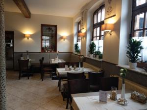 Een restaurant of ander eetgelegenheid bij Schlossgartenpassage