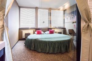 Posteľ alebo postele v izbe v ubytovaní Hotel Fado Spa & Restaurant
