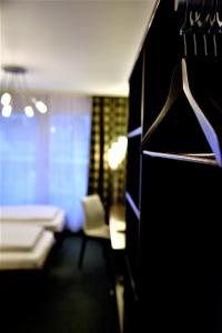 Postel nebo postele na pokoji v ubytování Hotel am Spisertor