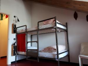 Postel nebo postele na pokoji v ubytování Attic Hostel Torino