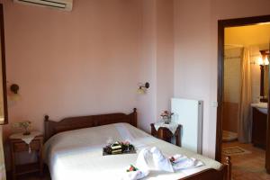 Postelja oz. postelje v sobi nastanitve Aegean House