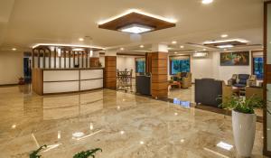 Lobi atau kawasan kaunter penerimaan di The Sanihara Hotel & Resort