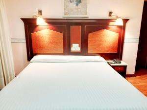 Postel nebo postele na pokoji v ubytování Hosteria Sara by gaiarooms