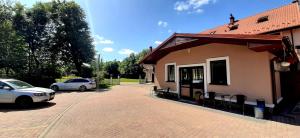 Fotografie z fotogalerie ubytování Zajazd Zamkowy - Schloßgasthof v destinaci Krąg