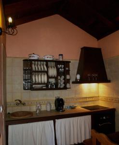 a kitchen with a sink and a counter top at Gran Drago in Valverde