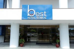 a sign for a hotel in front of a building at Best Hotel Sobral in Sobral