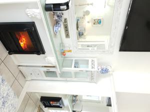 an overhead view of an rv kitchen with a tv at Belurana River Manor in Upington