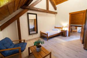 Voodi või voodid majutusasutuse Domaine du Moulin d'Asselborn toas