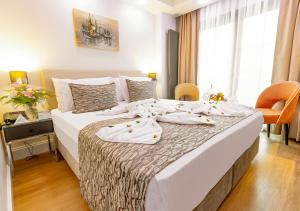 Postel nebo postele na pokoji v ubytování Antusa Design Hotel & Spa