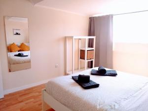 Postel nebo postele na pokoji v ubytování Lisboa Tejo in Cacilhas - New Apartment