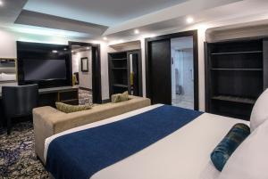 Voodi või voodid majutusasutuse Mövenpick Hotel Ikoyi Lagos toas