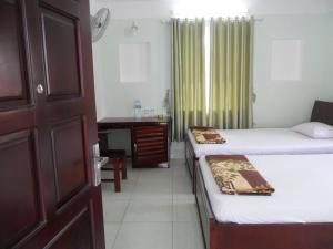 Cama o camas de una habitación en Thien Truc Guest House