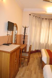 TV a/nebo společenská místnost v ubytování Kathmandu Peace Guesthouse